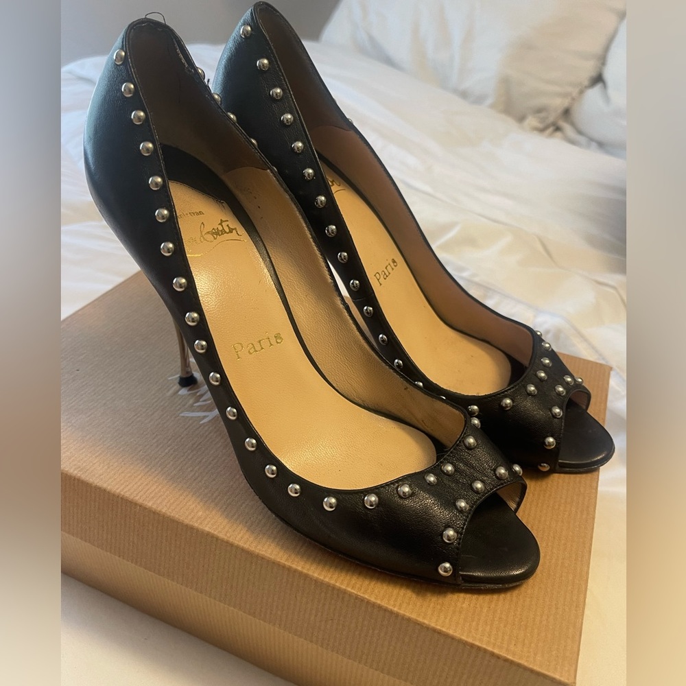 Christian Louboutin studded spike heels. 8 1/2
